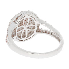 Elegant sterling silver ring showcasing intricate filigree design and sparkling accents.