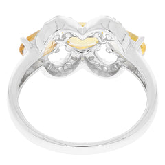View of an oval yellow sapphire ring with sterling silver setting, showcasing its elegant design and craftsmanship.