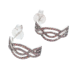 Elegant red diamond sterling silver earrings with intricate design and sparkling gemstones.