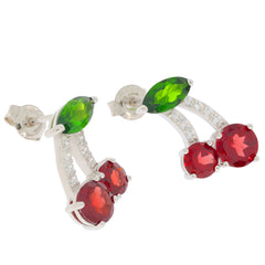 Red Garnet sterling silver earrings with Chrome Diopside accents, showcasing elegant vintage styling.