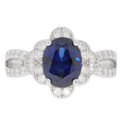 Blue Sapphire sterling silver ring with accent stones, featuring an oval blue gemstone for elegant style.