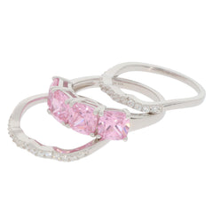 Three elegant sterling silver rings featuring pink gemstones and sparkling accents, showcasing timeless beauty and luxury.