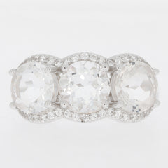 Round white Moissanite sterling silver ring with sparkling gemstone accents, showcasing timeless elegance.