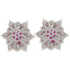 Oval pink sapphire sterling silver earrings with ornate design and sparkling gemstones for elegant style.