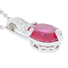 Oval red ruby sterling silver pendant with moissanite accent, showcasing luxury and elegance.