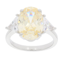 Yellow sapphire sterling silver ring with accent stones, showcasing elegance and luxury in jewelry.