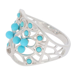 Elegant silver ring with round blue turquoise gemstones, showcasing a stylish openwork design.