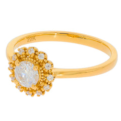 Elegant 22K gold ring featuring a round white diamond in a stunning floral design with additional diamond accents.