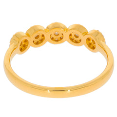 22K yellow gold ring featuring diamond accents, showcasing a sleek and elegant design perfect for any occasion.