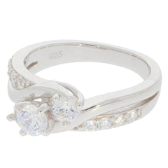 White Moissanite sterling silver ring with accent stones, showcasing elegant design and brilliance.