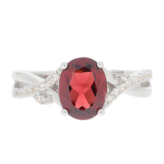Elegant red garnet sterling silver ring with diamond accent, showcasing timeless beauty and luxury.