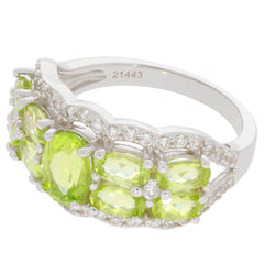 Green Peridot Sterling Silver Ring with Diamond Accent, featuring vibrant gemstones and intricate design.