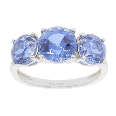 Blue Tanzanite Sterling Silver Ring featuring three sparkling gemstone accents.