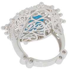Elegant oval blue turquoise sterling silver ring with intricate filigree design and sapphire accents.