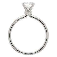 Round white Moissanite sterling silver ring featuring a sparkling gemstone on a sleek band, perfect for elegance.
