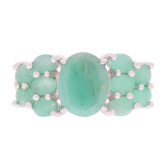 Oval green emerald sterling silver ring with accent gemstones, showcasing a luxurious and elegant design.