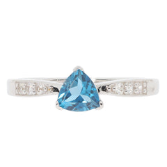 Trillion blue topaz sterling silver ring with accent stones, showcasing elegance and luxury in jewelry design.