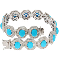 Oval Blue Turquoise Sterling Silver Bracelet with sparkling accents, elegant design for sophisticated style.