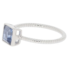 Princess blue sapphire sterling silver ring featuring a sparkling princess-cut gemstone in an elegant design.