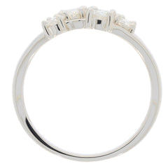Elegant white moissanite sterling silver ring featuring a sparkling gemstone accent, perfect for sophisticated style.