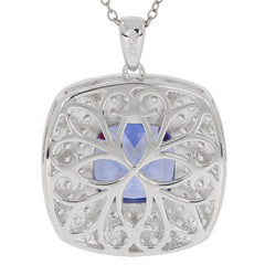 Blue Sapphire Sterling Silver Pendant with floral design, showcasing a shimmering gemstone and an elegant chain.