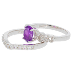 Round purple amethyst sterling silver ring with accent stones, showcasing luxury and elegance.