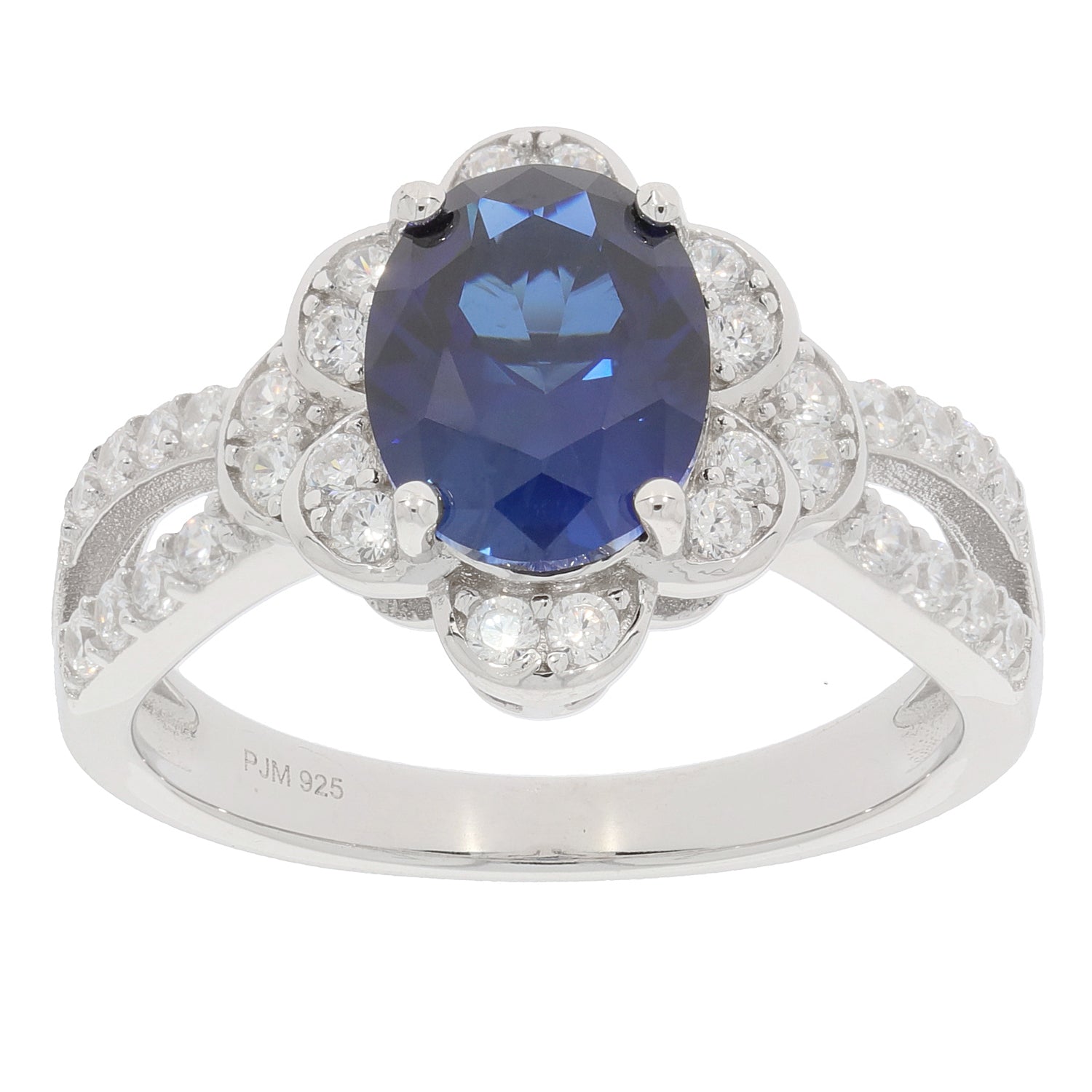 Blue sapphire sterling silver ring with accent stones, elegant jewelry for sophisticated style.