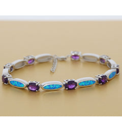 Purple Amethyst and Opal Sterling Silver Bracelet on a golden background, showcasing elegance and luxury.