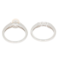 Elegant white pearl sterling silver ring showcasing a sparkling gemstone accent, perfect for sophisticated style.