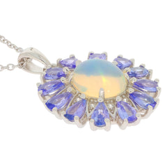 Elegant blue opal sterling silver pendant with sparkling tanzanite accents, perfect for sophisticated jewelry collections.
