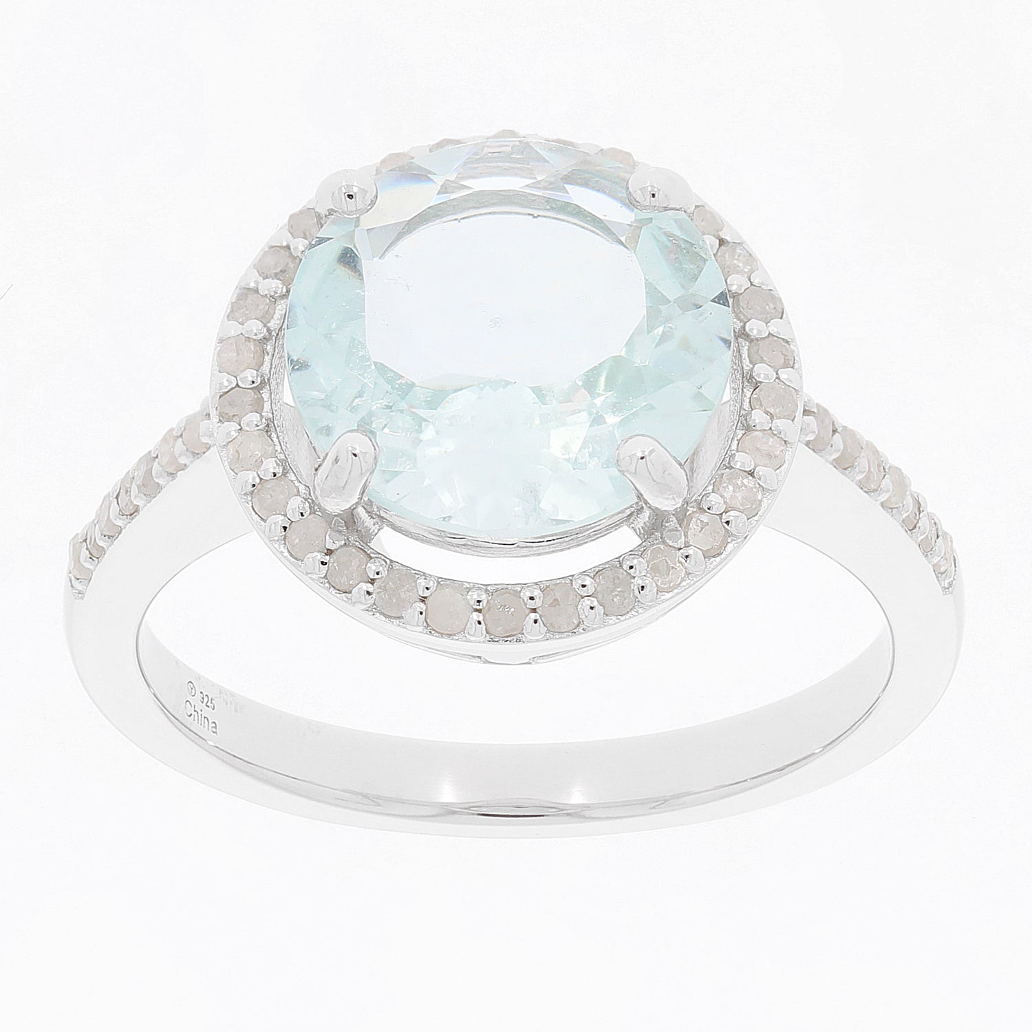 Blue aquamarine sterling silver ring with diamond accent, showcasing elegance and luxury.