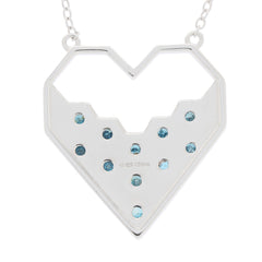 Blue diamond sterling silver heart necklace with gemstone accents, elegant and stylish jewelry piece.