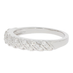 Elegant white diamond sterling silver ring with sparkling accents, showcasing a luxurious design.