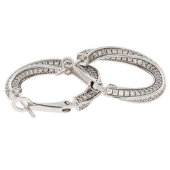 Round white diamond sterling silver earrings featuring a sparkling gemstone accent and elegant design.
