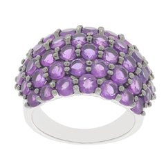 Round sterling silver ring featuring multiple sparkling purple amethyst gemstones in a stylish design.