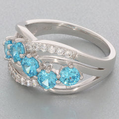Blue Topaz Sterling Silver Ring with sparkling accents, showcasing stunning gemstones in a stylish design.