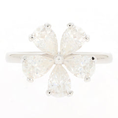 Elegant white Moissanite sterling silver ring featuring a floral design with sparkling gemstones.
