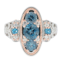 Blue London Topaz sterling silver ring with sparkling accents and elegant design.