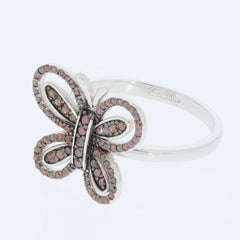 Sterling silver butterfly ring featuring sparkling red gemstones, elegant design for stylish accessory collection.