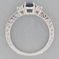Elegant Blue Moissanite Sterling Silver Ring with intricate design and sparkling gemstones, perfect for sophisticated style.