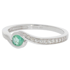 Round green emerald sterling silver ring with accent stone, elegant jewelry piece, perfect for special occasions.