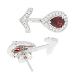 Sterling silver earrings featuring a pear-shaped red garnet with moissanite accents, exuding luxury and elegance.