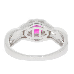 Elegant pink sapphire Sterling Silver ring showing diamond accents from the side, highlighting luxurious gemstone details.