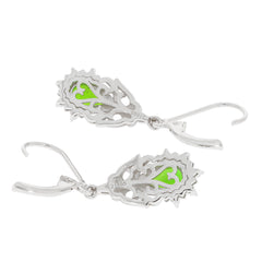 Sterling silver earrings featuring green chrome diopside accent, showcasing elegant design and gemstone brilliance.