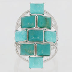 Emerald Blue Turquoise Sterling Silver Ring featuring multiple turquoise stones set in elegant silver band.