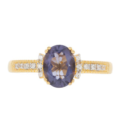 Purple sapphire sterling silver ring with sparkling gemstone accents, perfect for elegant occasions.