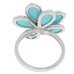 Elegant Blue Turquoise Sterling Silver Ring featuring a floral design with multiple turquoise accents.