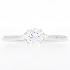 White Moissanite sterling silver ring with accent gemstones, showcasing elegance and timeless beauty.