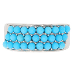 Round blue turquoise sterling silver ring, featuring multiple vibrant turquoise gemstones in a stylish design.