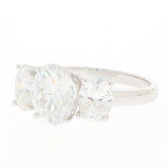 Elegant white Moissanite sterling silver ring featuring sparkling gemstones in a stunning design.